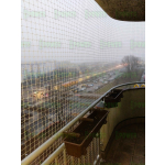 Siatki zabezpieczające balkon dla kota