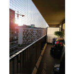 Bezinwazyjny Montaż siatki zabezpieczającej na balkon dla kota