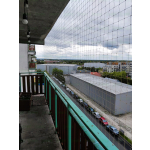 Wzmocniona siatka ochronna przeciw ptakom na balkon montaż Warszawa