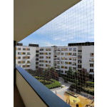 Montaż siatki zabezpieczającej na balkon przed ptakami bez wiercenia Warszawa