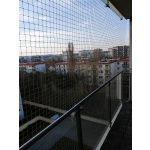 Siatka na balkon wzmocniona drutem dla kota na balkon montaż Warszawa